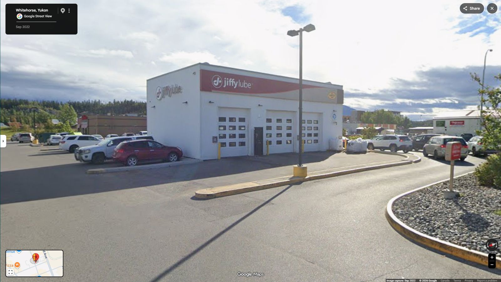 Street view of the Tim Hortons drive-through and oil change in Whitehorse